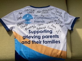 Sally's t-shirt from London Landmarks Half Marathon with children's names written on it.